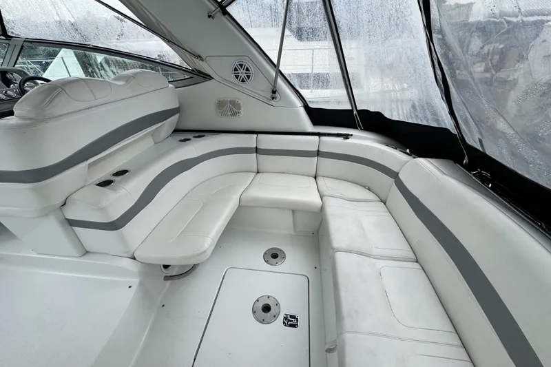 Slide: The Image of 2005 Formula 34 Performance Cruiser interior with white seating and gray accents. - 31