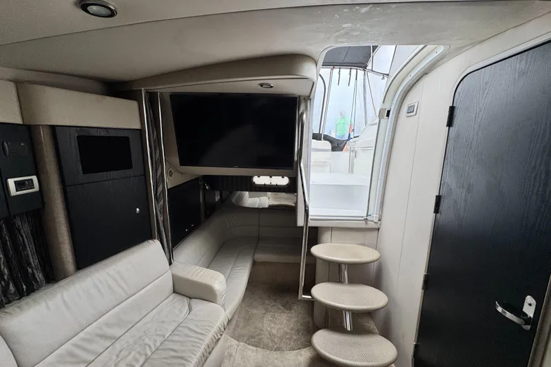 Slide: The Image of Interior of 2005 Formula 34 Performance Cruiser with modern seating and entertainment area. - 37