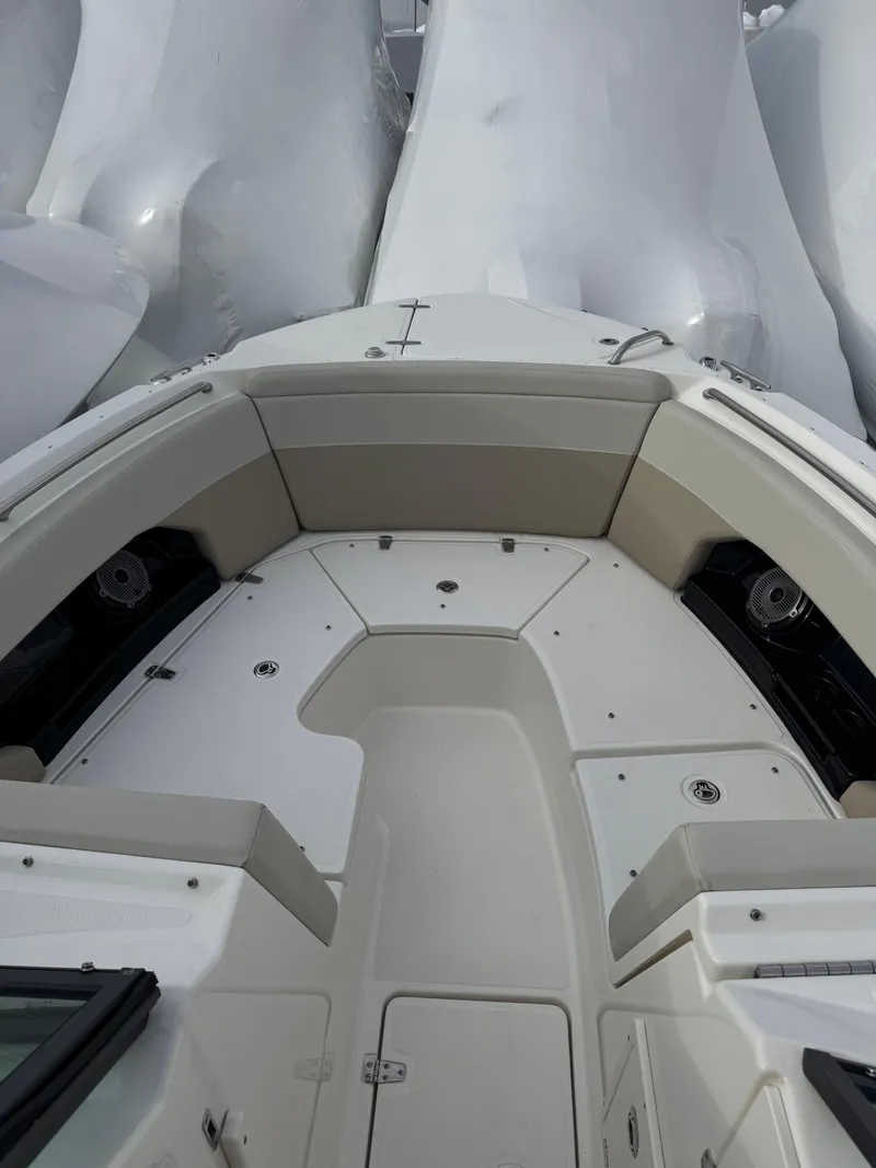 Slide: The Image of 2022 Boston Whaler 240 Vantage boat interior, featuring spacious seating and sleek design. - 7