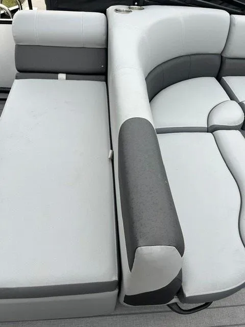 Slide: The Image of 2025 Veranda VF22F2 Deluxe boat seating, featuring gray and white cushioned upholstery. - 10