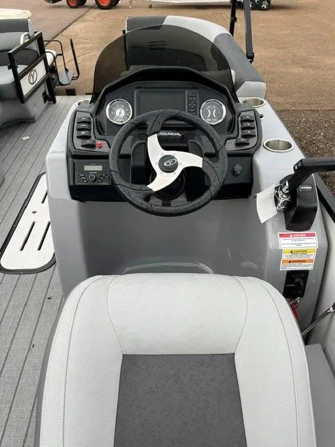 Slide: The Image of 2025 Veranda VF22F2 Deluxe boat cockpit with steering wheel and control panel. - 9