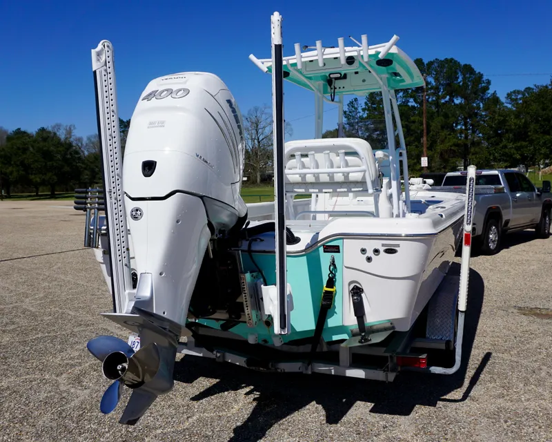 Slide: The Image of 2022 Blue Wave 2600 PureBay boat with powerful outboard motor on trailer. - 4
