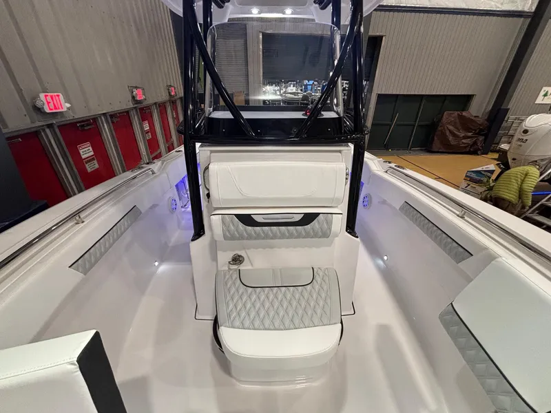 Slide: The Image of 2025 Blackfin 222 CC boat interior with modern seating and sleek design. - 9