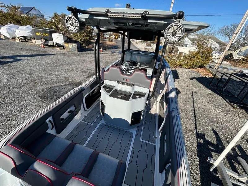 Slide: The Image of 2024 Glasstream 32 GSX boat with modern interior and advanced navigation features. - 12