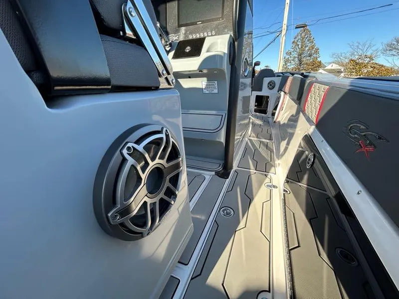 Slide: The Image of 2024 Glasstream 32 GSX boat interior with speaker and modern dashboard. - 17