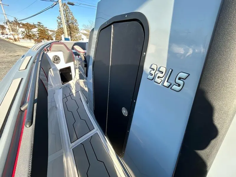 Slide: The Image of 2024 Glasstream 32 GSX boat, sleek design, modern deck, and stylish detailing. - 23
