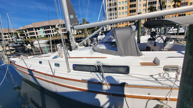 Slide: The Image of 1999 Beneteau Oceanis 44 CC sailboat docked in marina, sunny day. - 22
