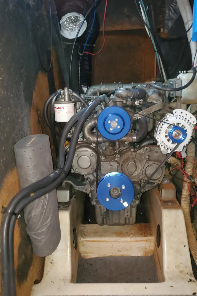 Slide: The Image of Engine of 1999 Beneteau Oceanis 44 CC sailboat, showcasing mechanical components. - 39
