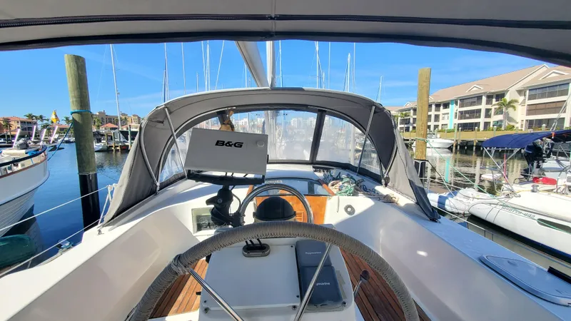 Slide: The Image of Cockpit view of 1999 Beneteau Oceanis 44 CC sailboat docked at marina. - 9