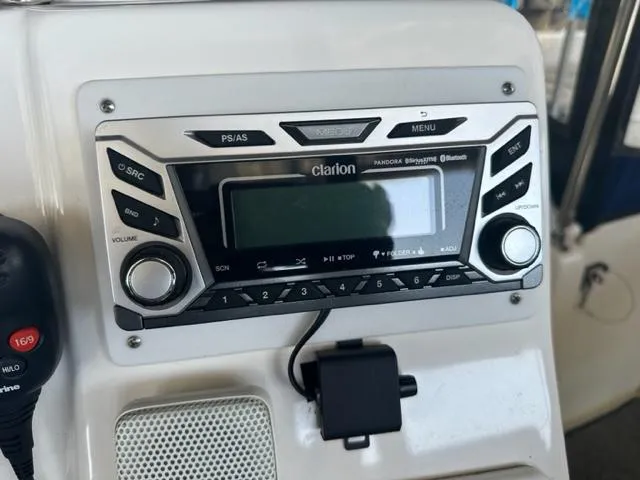 Slide: The Image of Clarion stereo system on 1998 Silverton 372 Motor Yacht dashboard. - 39