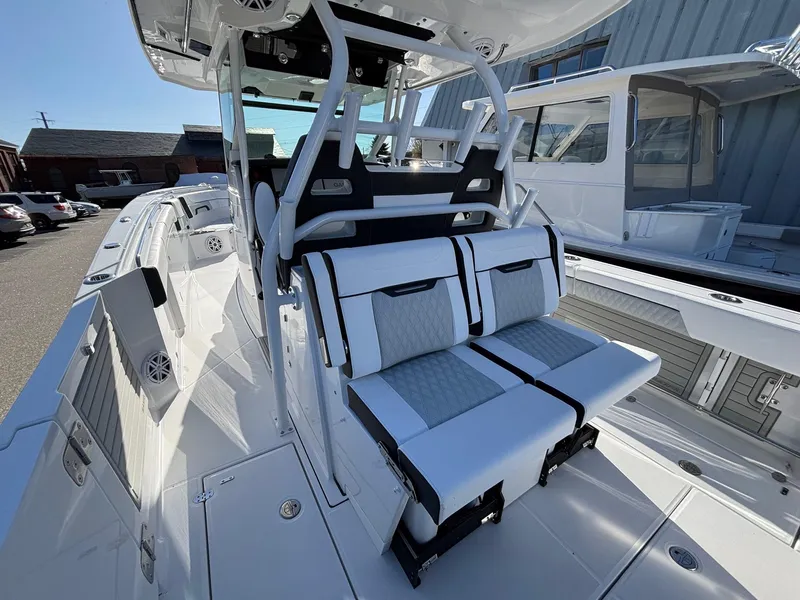 Slide: The Image of 2025 Blackfin 332 CC boat interior with modern seating and sleek design. - 7