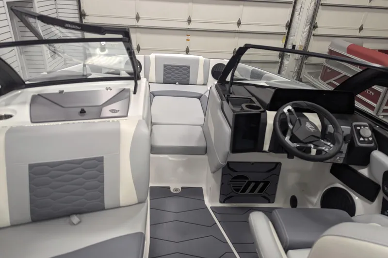 Slide: The Image of 2025 Malibu Wakesetter 24 MXZ interior with modern design and sleek dashboard. - 20