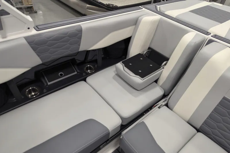 Slide: The Image of 2025 Malibu Wakesetter 24 MXZ interior seating with modern design and premium upholstery. - 23