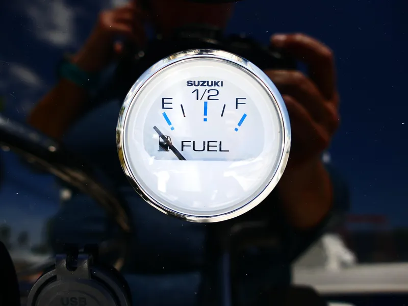 Slide: The Image of 2025 Bulls Bay 2000 boat interior with steering console and seating. - 10