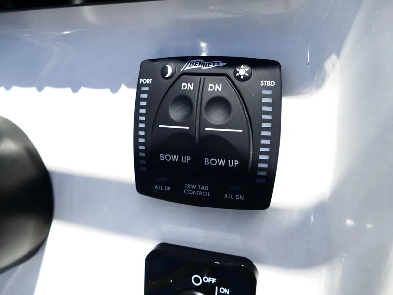 Slide: The Image of Bulls Bay 2000 boat console, 2025 model, featuring steering wheel and control panel. - 12