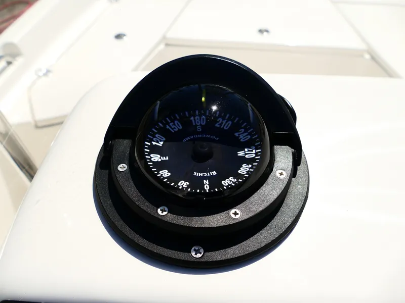 Slide: The Image of Dashboard of 2025 Bulls Bay 2000 boat with compass and gauges. - 13