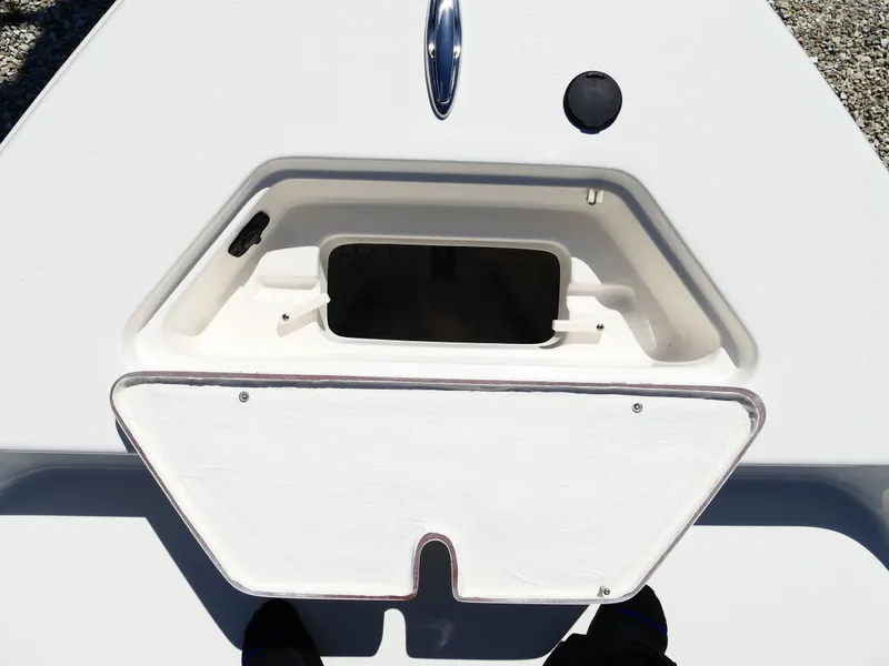 Slide: The Image of Bennett trim tab control panel on 2025 Bulls Bay 2000 boat dashboard. - 17