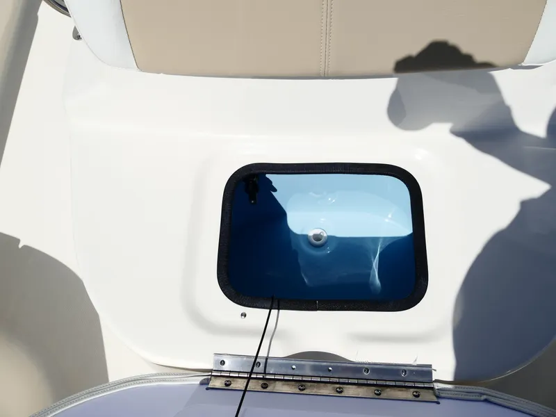 Slide: The Image of 2025 Bulls Bay 2000 boat deck with storage compartments, displayed outdoors. - 20