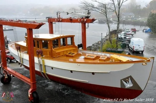 Slide: The Image of Alden 62 ft motor sailer from 1938, custom design by Rockport Marine, in a boatyard. - 16