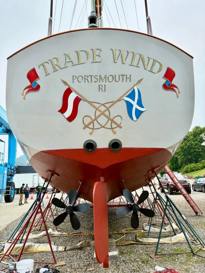 Slide: The Image of Sailboat "Trade Wind" in Portsmouth, RI, Alden Custom Design, 1938, with nautical flags and propellers. - 18