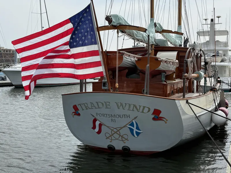 Slide: The Image of Classic 1938 Alden yacht "Trade Wind" with American flag, docked in Portsmouth, RI marina. - 26