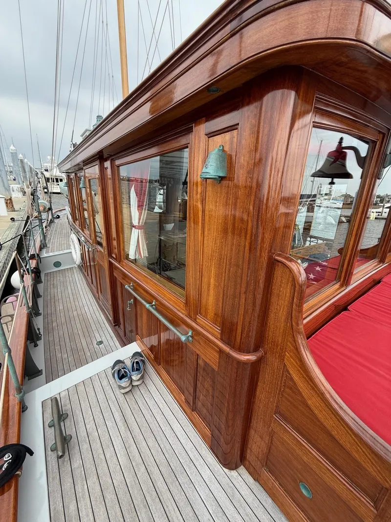 Slide: The Image of Elegant wooden yacht deck with polished cabin, Alden Custom Design, 1938, Rockport Marine restoration. - 34