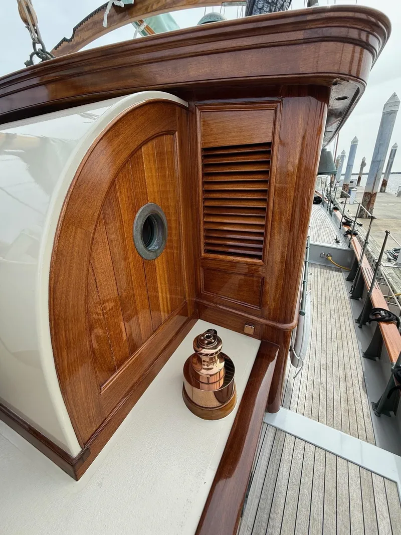 Slide: The Image of Elegant wooden yacht detail, Alden Custom Design, 1938, restored by Rockport Marine, docked. - 44