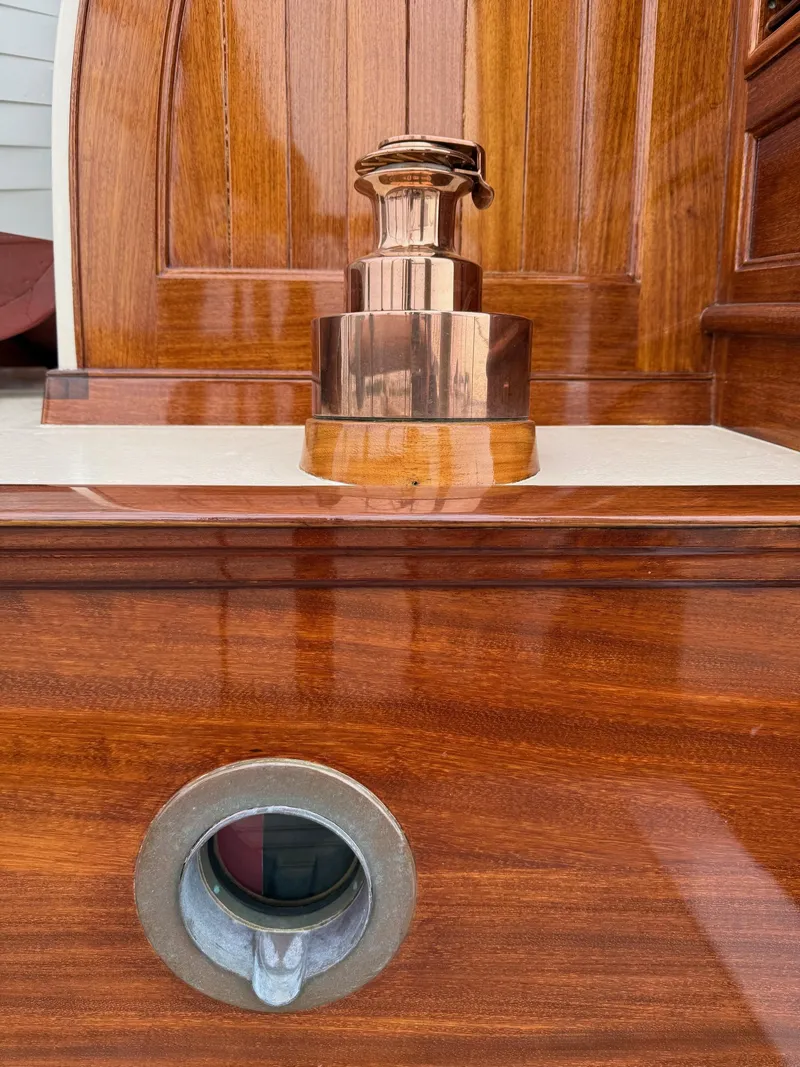 Slide: The Image of Polished wood and brass detail on 1938 Alden custom design boat by Rockport Marine. - 45