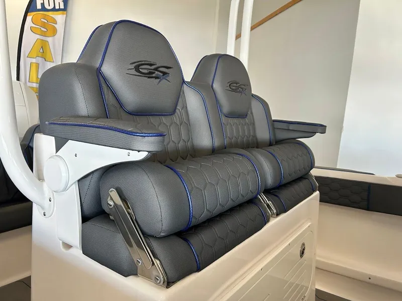 Slide: The Image of 2024 Glasstream 28 GSX Pro boat seats with blue accents, for sale sign visible. - 15