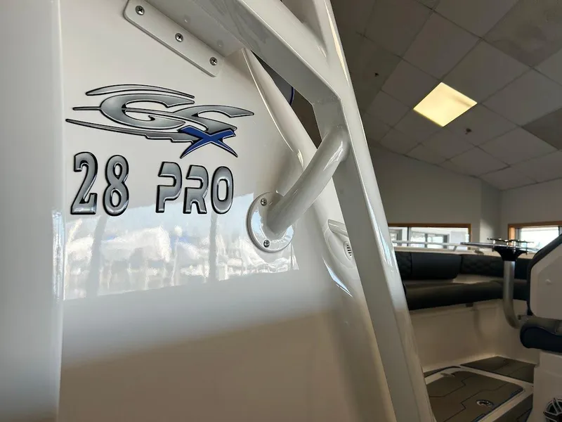 Slide: The Image of 2024 Glasstream 28 GSX Pro boat interior, showcasing sleek design and branding details. - 17