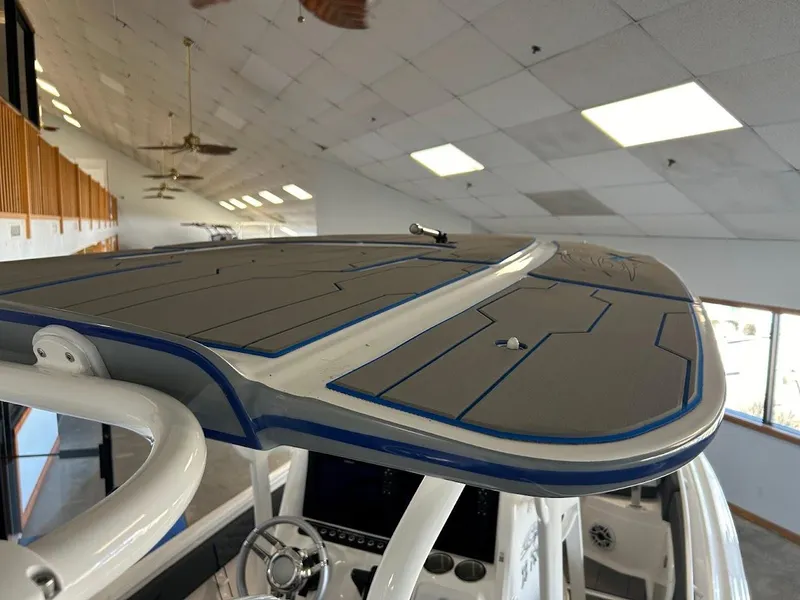 Slide: The Image of 2024 Glasstream 28 GSX Pro boat interior, showcasing helm and overhead design. - 18