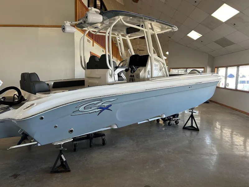 Slide: The Image of 2024 Glasstream 28 GSX Pro boat displayed indoors on stands. - 4