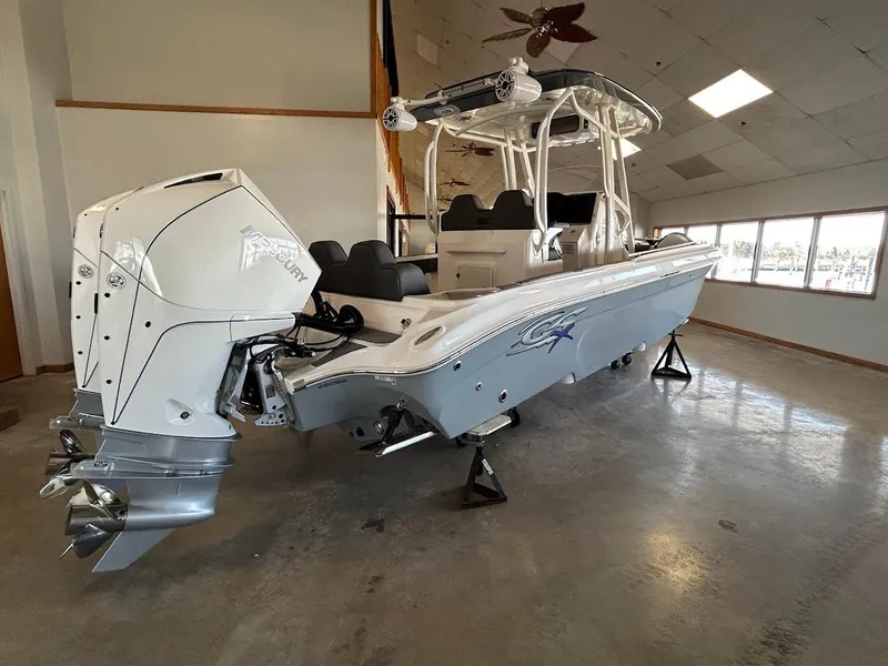 Slide: The Image of 2024 Glasstream 28 GSX Pro boat in showroom, featuring sleek design and powerful engine. - 5