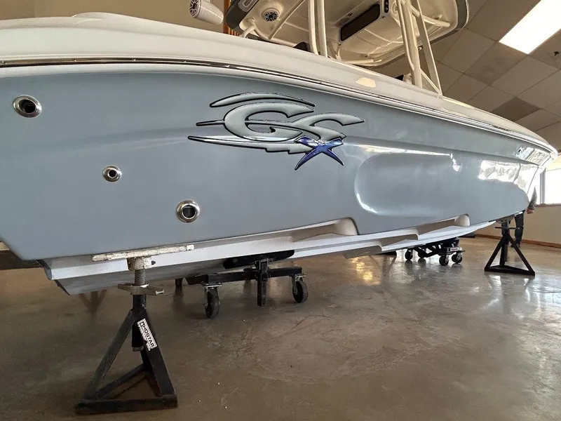 Slide: The Image of 2024 Glasstream 28 GSX Pro boat on stands in showroom. - 7