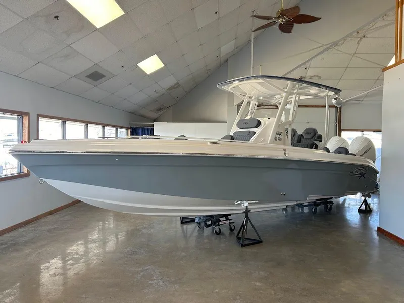 Slide: The Image of 2024 Glasstream 28 GSX Pro boat displayed indoors, showcasing sleek design and modern features. - 8