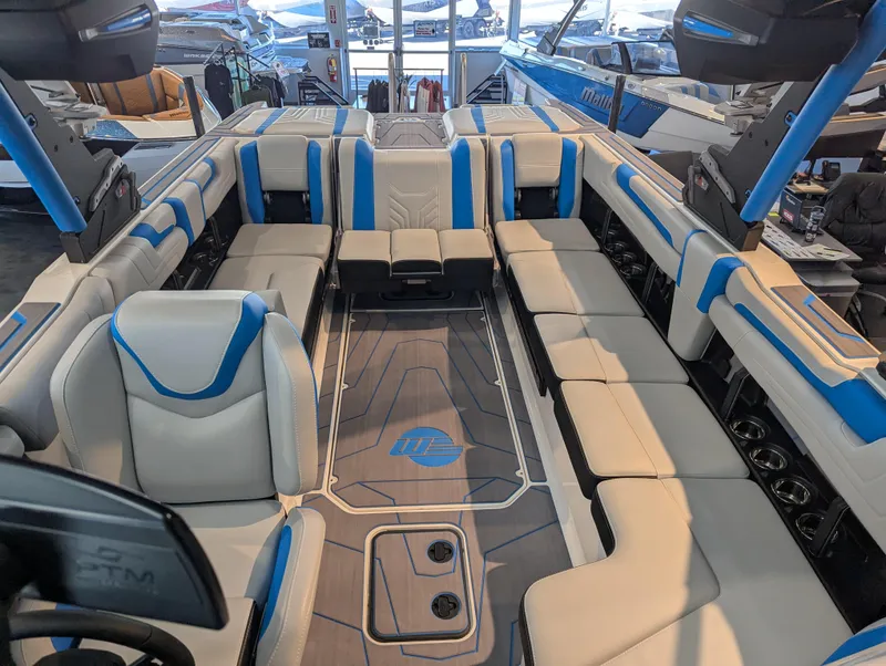 Slide: The Image of 2025 Malibu Wakesetter 25 LSV interior with spacious seating and modern design. - 17