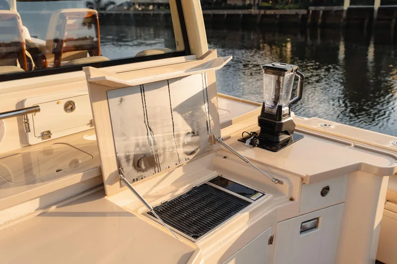 Slide: The Image of 2022 HCB 53 Sueños boat interior with a blender on the counter. - 11