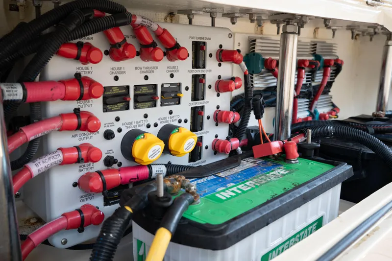 Slide: The Image of Electrical panel and battery setup in 2022 HCB 53 Sueños boat. - 18