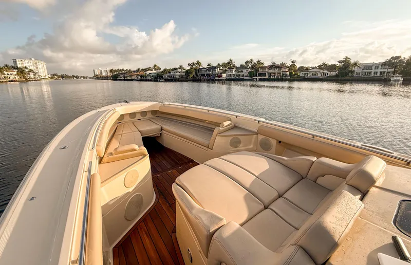 Slide: The Image of Luxurious 2022 HCB 53 Sueños yacht interior with plush seating on calm waters. - 27