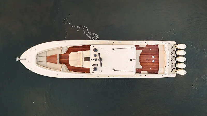 Slide: The Image of Aerial view of 2022 HCB 53 Sueños luxury yacht on calm water. - 4