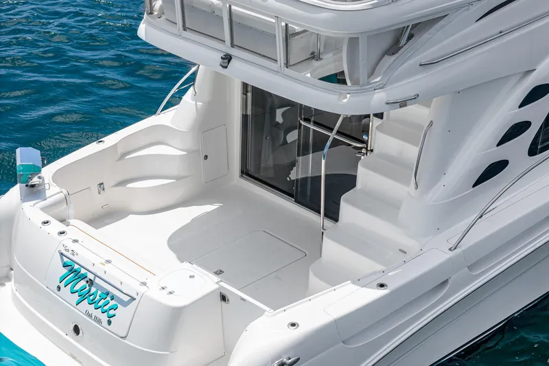 Slide: The Image of 2008 Sea Ray 58 Sedan Bridge yacht with spacious deck and elegant design. - 23