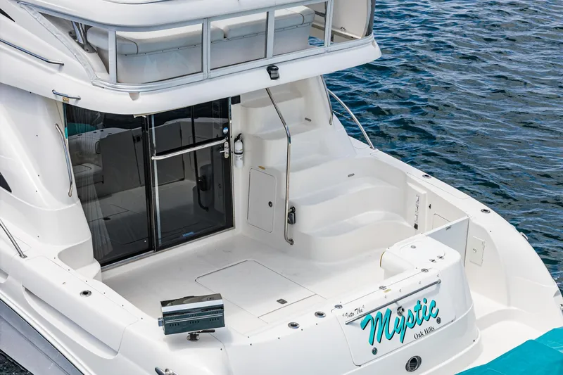 Slide: The Image of 2008 Sea Ray 58 Sedan Bridge yacht with spacious deck and elegant design. - 24