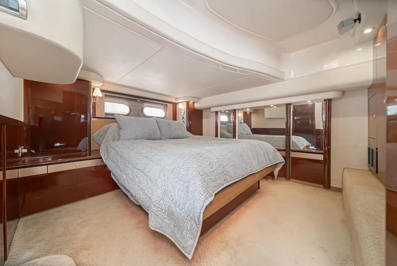 Slide: The Image of Luxurious bedroom interior of 2008 Sea Ray 58 Sedan Bridge yacht. - 30