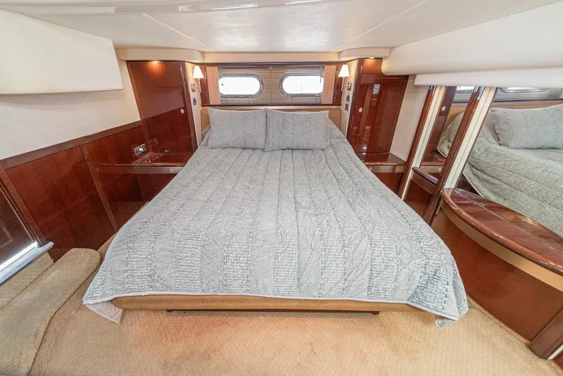 Slide: The Image of Luxurious bedroom interior of 2008 Sea Ray 58 Sedan Bridge yacht. - 31