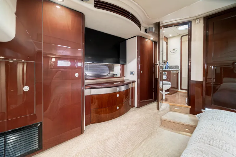 Slide: The Image of Luxurious interior of 2008 Sea Ray 58 Sedan Bridge yacht with wood finishes and modern amenities. - 32