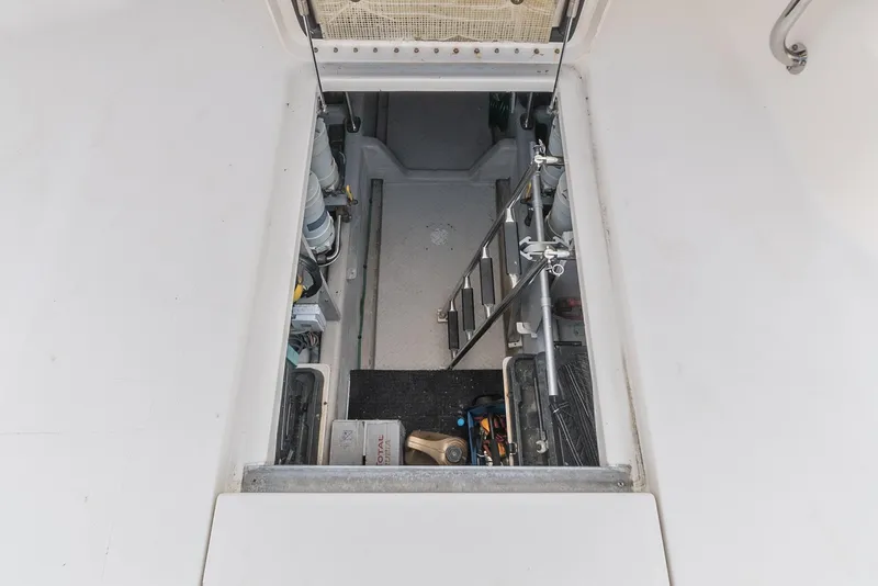 Slide: The Image of Engine room access hatch on 2008 Sea Ray 58 Sedan Bridge yacht. - 41