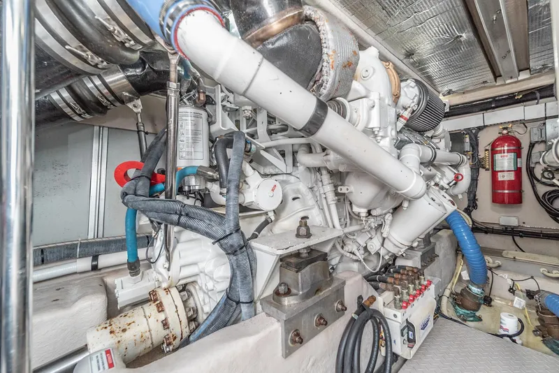 Slide: The Image of Engine room of 2008 Sea Ray 58 Sedan Bridge yacht, showcasing mechanical components. - 44