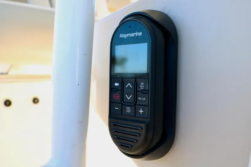 Slide: The Image of Raymarine control panel on 2022 Boston Whaler 330 Outrage boat dashboard. - 43