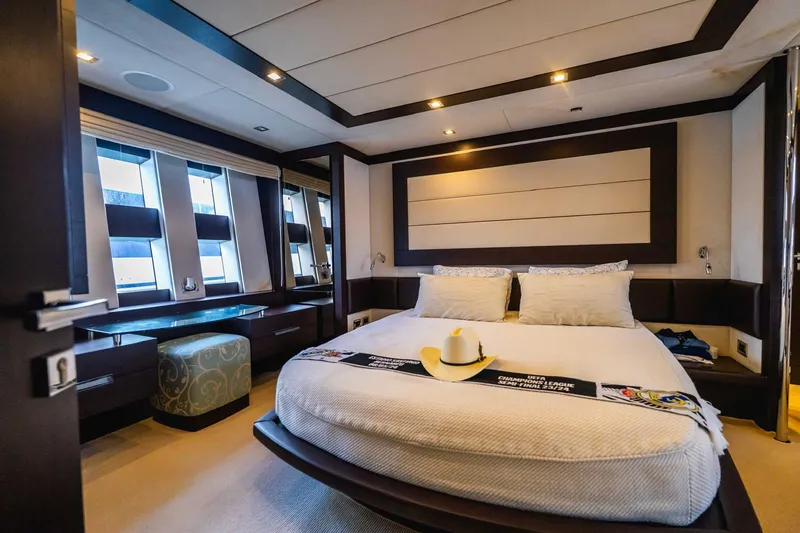 Slide: The Image of Luxurious bedroom interior of 2010 Azimut 86S yacht with modern decor and large windows. - 10