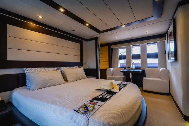 Slide: The Image of Luxurious bedroom interior of 2010 Azimut 86S yacht with modern furnishings and elegant design. - 12